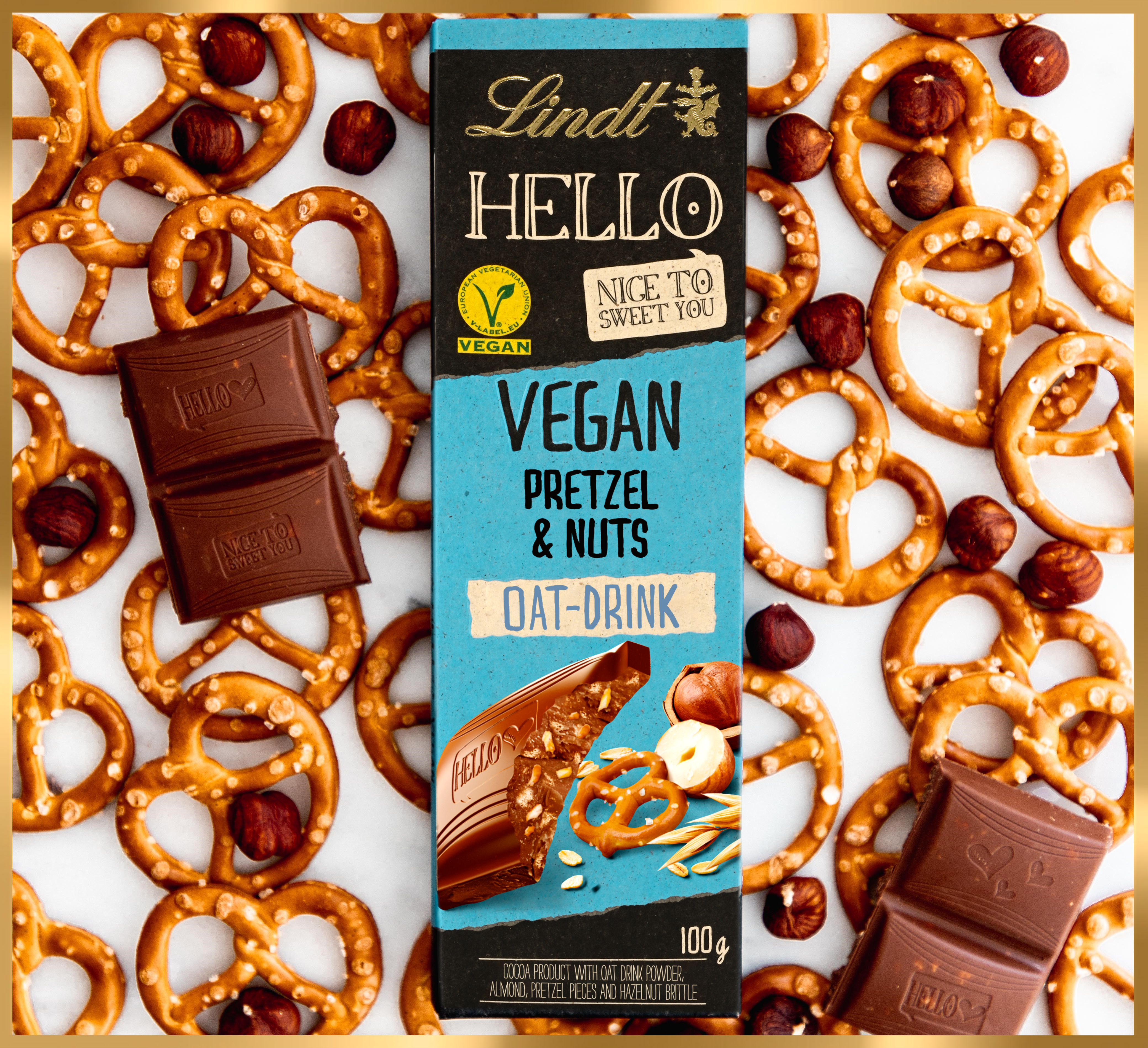Produktfoto: Lindt En chokladkaka på en bädd av kringlor och chokladbitar.