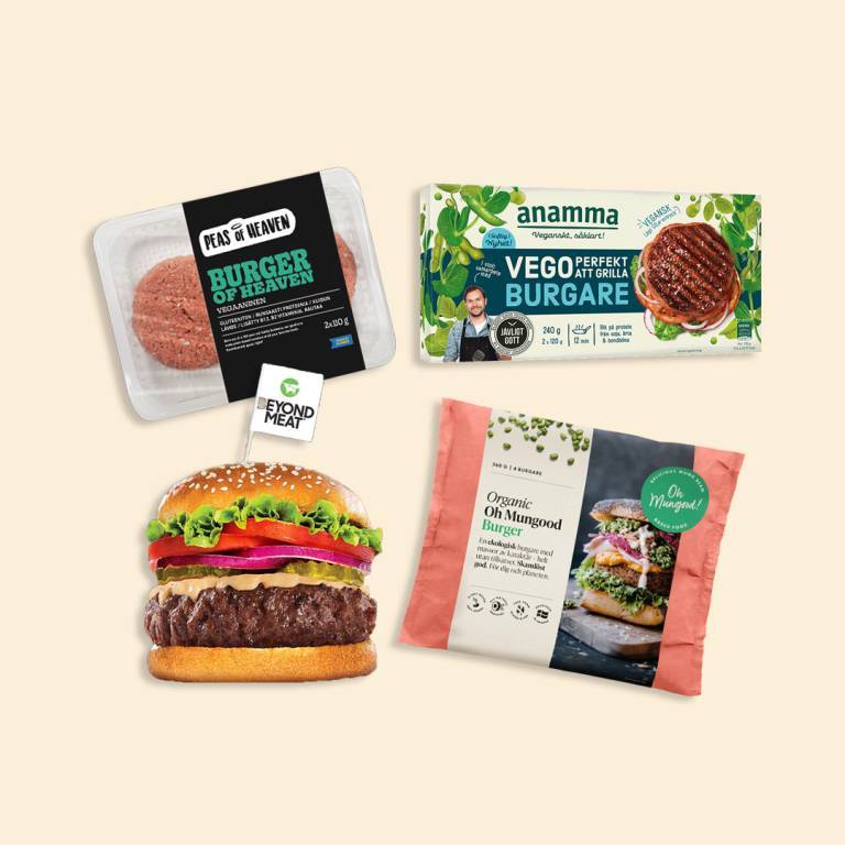 Fyra olika veganska burgare mot en ljusgul bakgrund