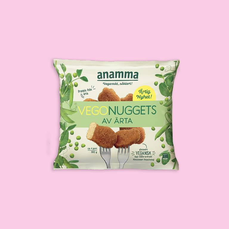 En påse nuggets mot en ljusrosa bakgrund