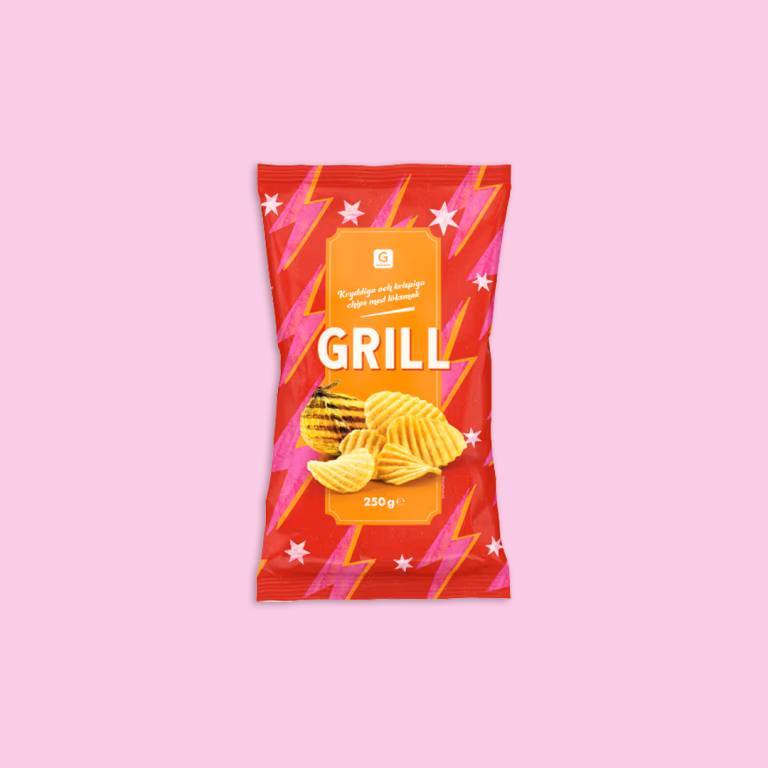 en påse chips mot en ljusrosa bakgrund