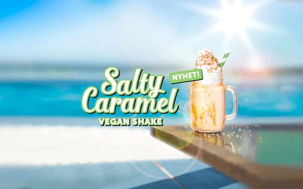 Vegansk shake från tacobar med en strand i bakgrunden