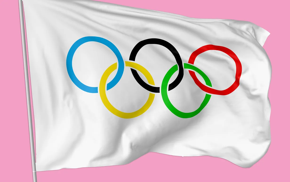 Olympisk flagga mot rosa bakgrund