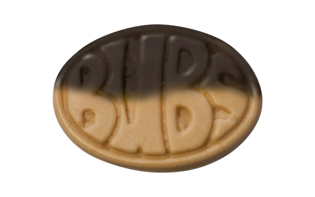 En godis mot en vit bakgrund