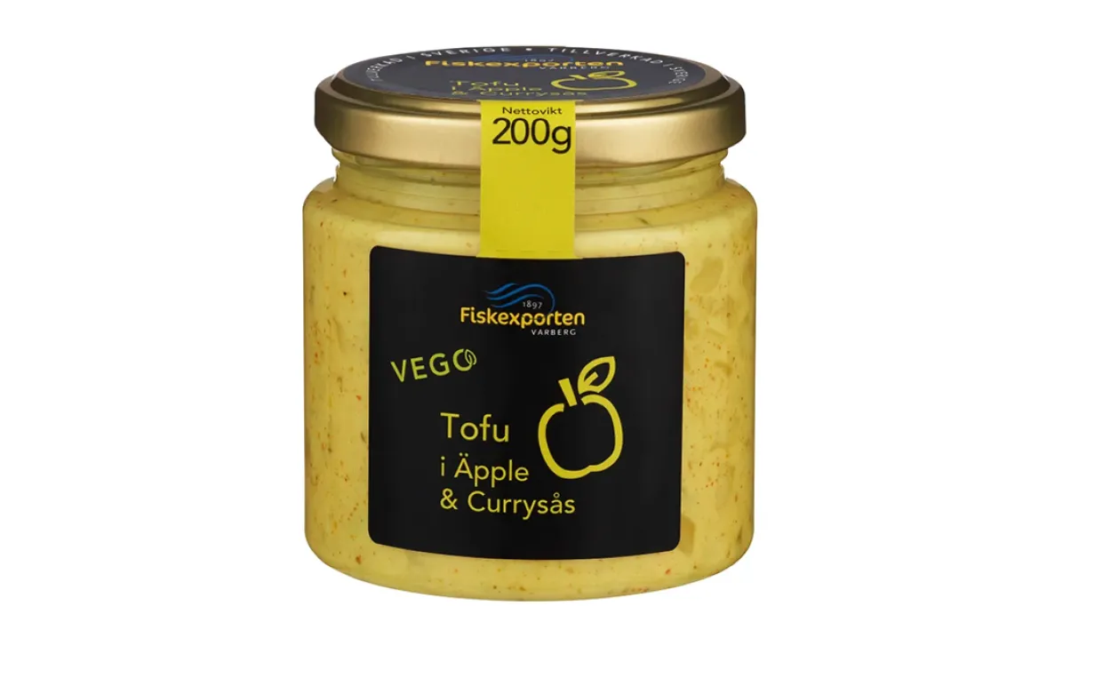 en burk med vegansk sill mot en vit bakgrund