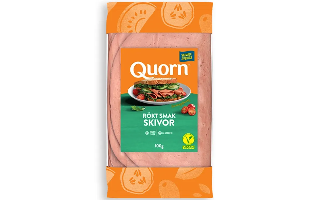 Ett paket växtbaserade påläggsskivor i en förpackning mot en vit bakgrund