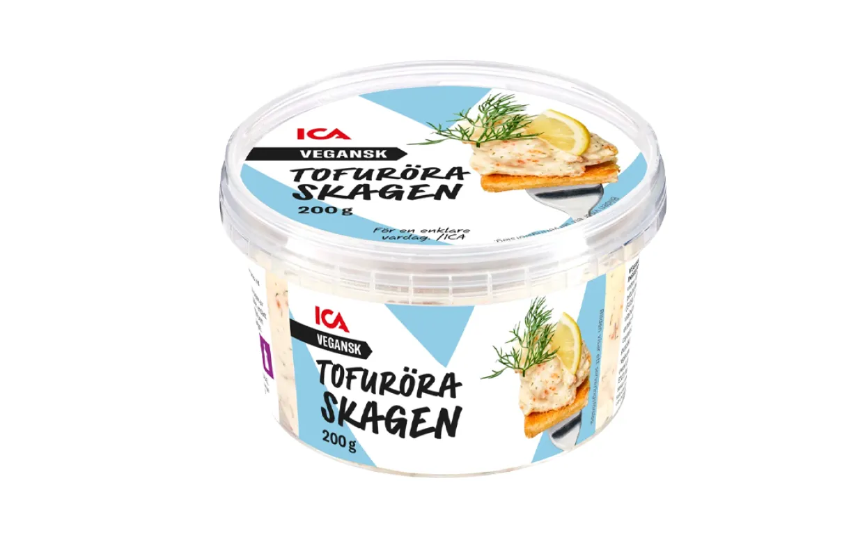 en burk med skagenröra mot en vit bakgrund