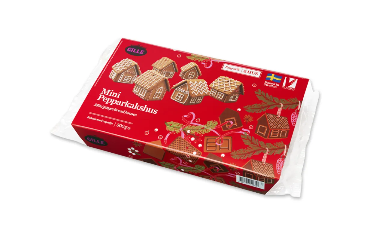 En förpackning pepparkakshus mot en vit bakgrund