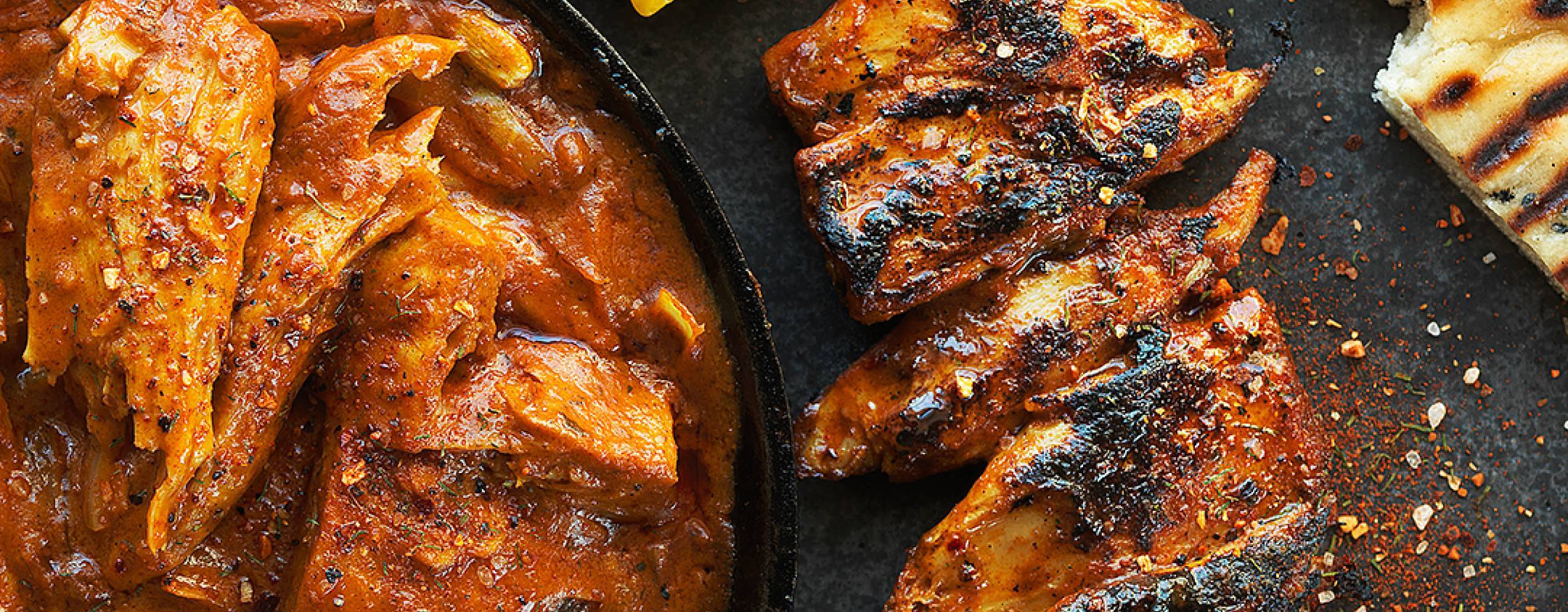 Vegansk Tikka Masala på ett spett bredvid en tallrik